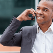 Man using VoIP service on mobile phone