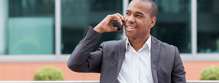 Man using VoIP service on mobile phone