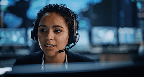 Woman technician in security room